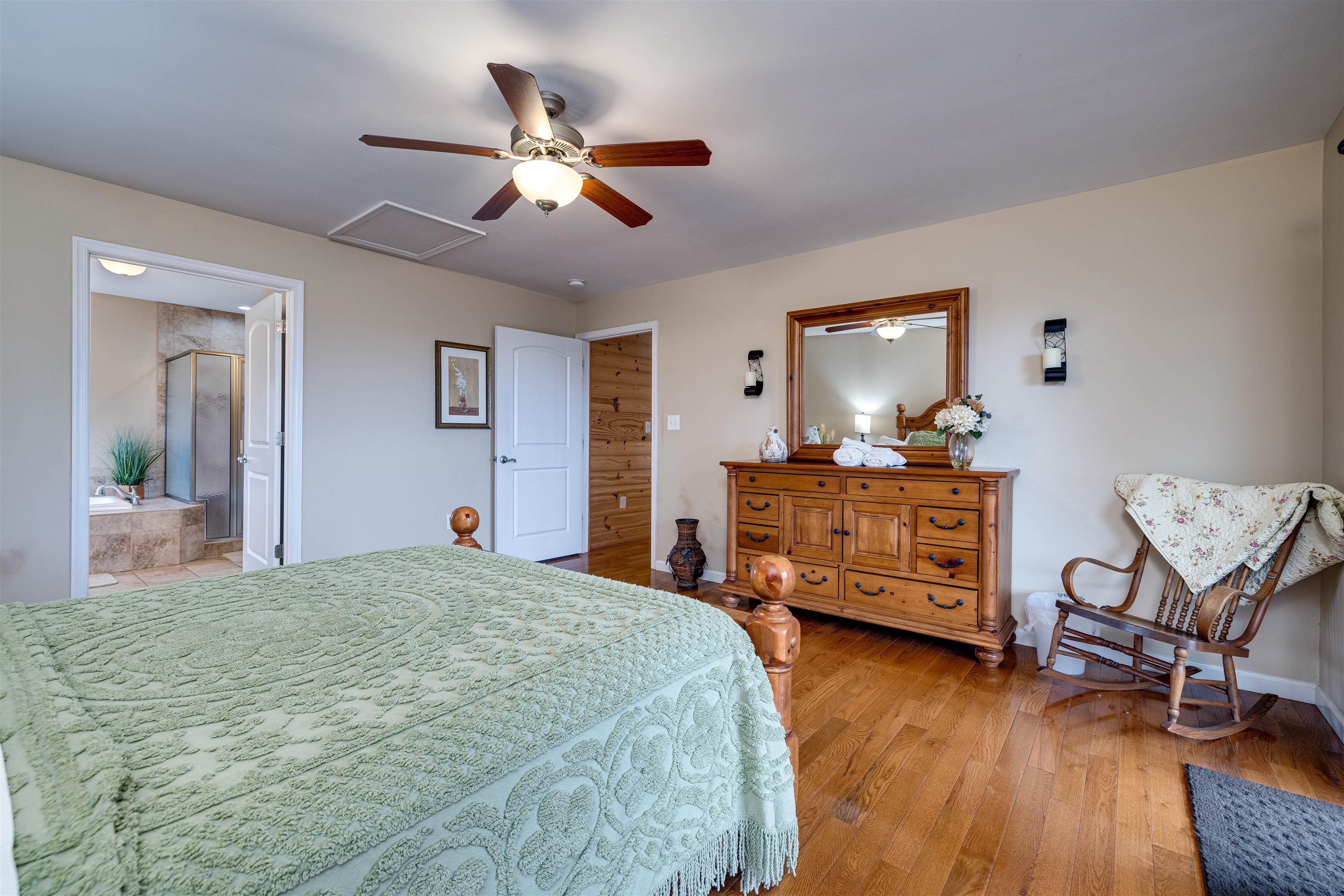 2225-2319 Valley Burg Road Luray, VA 22835 - Photo 39 of 57 a bedroom with a bed and wooden floor