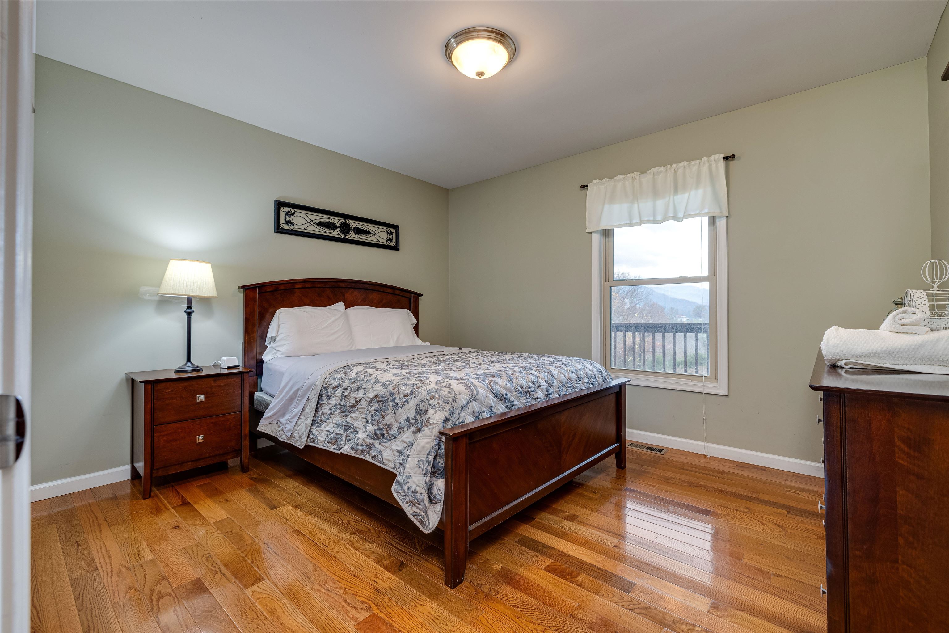 2225-2319 Valley Burg Road Luray, VA 22835 - Photo 44 of 57 a bedroom with a bed and window