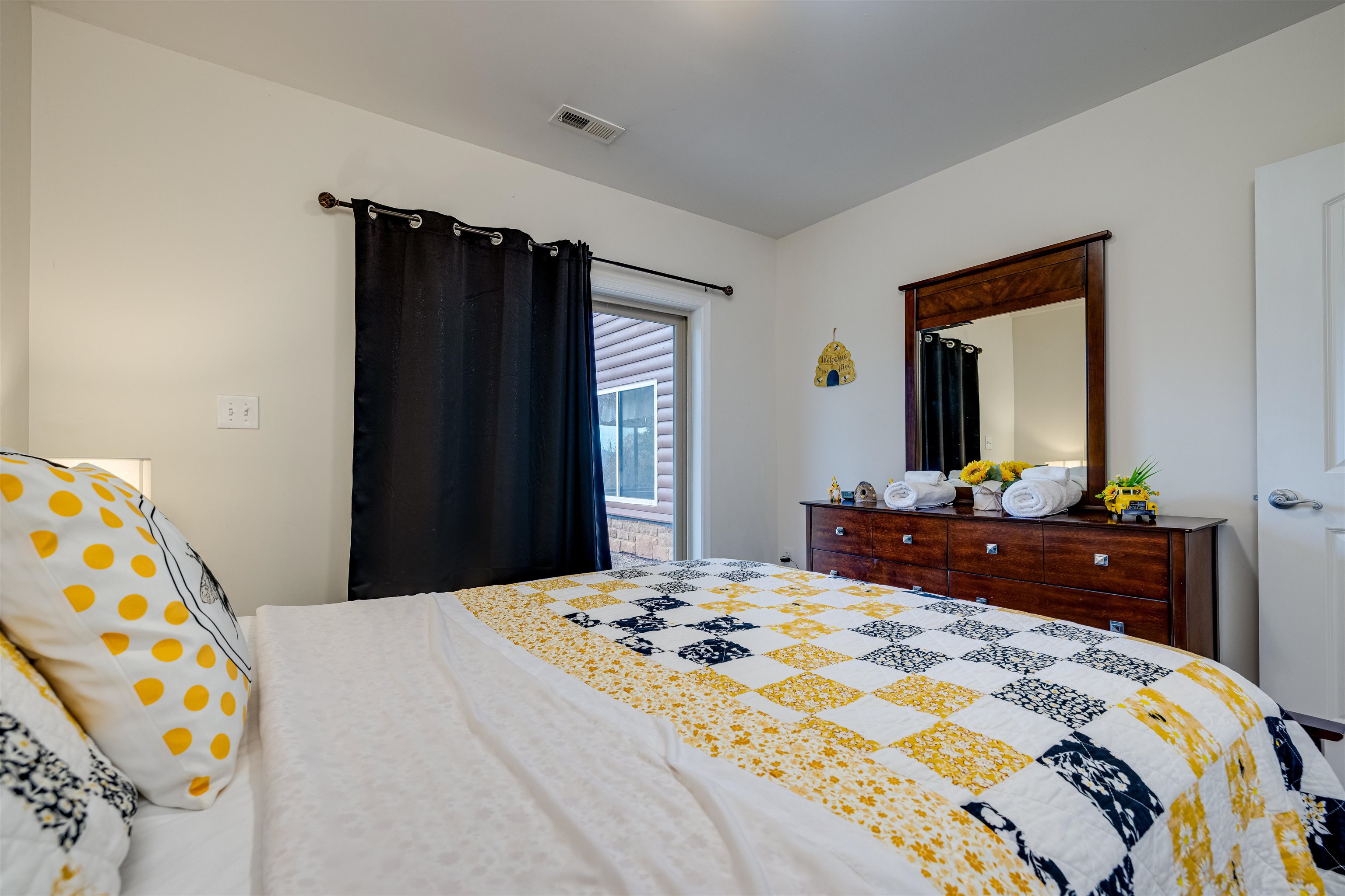 2225-2319 Valley Burg Road Luray, VA 22835 - Photo 50 of 57 a bedroom with a bed and a dresser in it