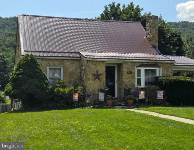 a house view with a garden space