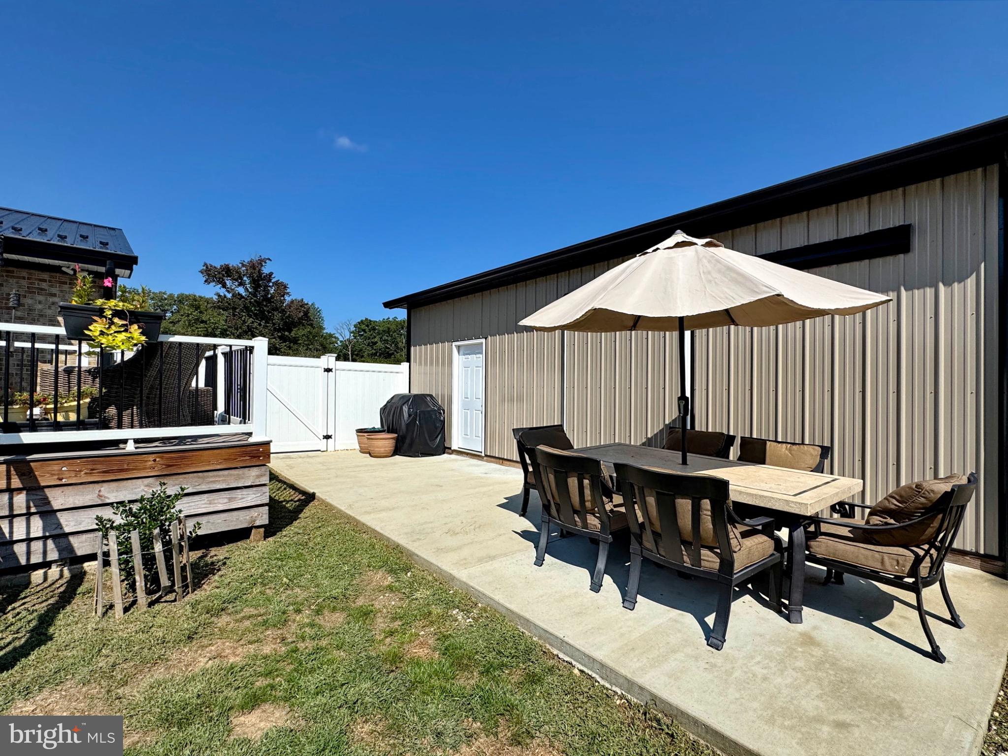 7406 Robin Road La Plata, MD 20646 - Photo 11 of 89 Sunny patio retreat with inviting shade.