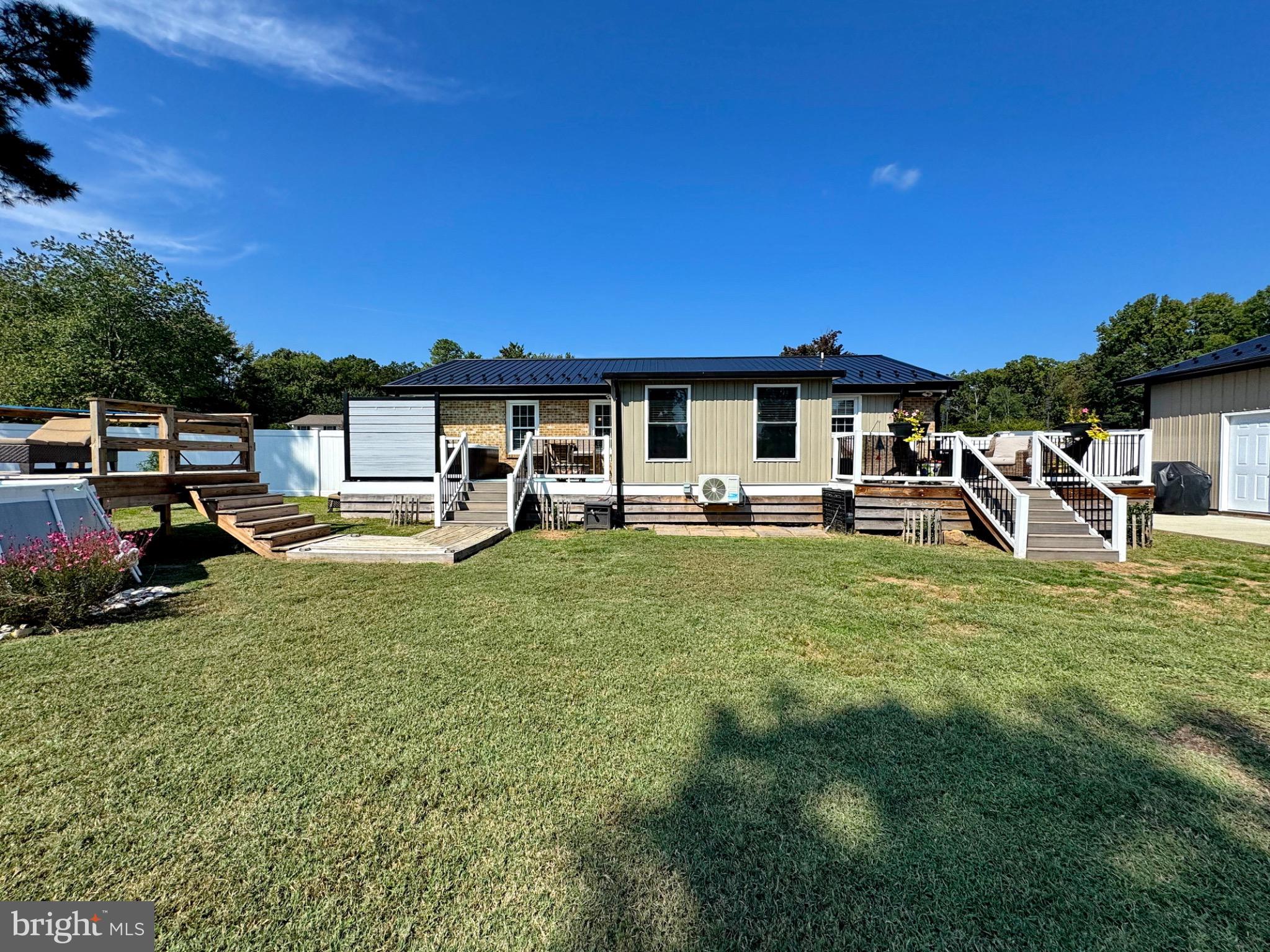 7406 Robin Road La Plata, MD 20646 - Photo 12 of 89 Charming home with spacious outdoor deck.
