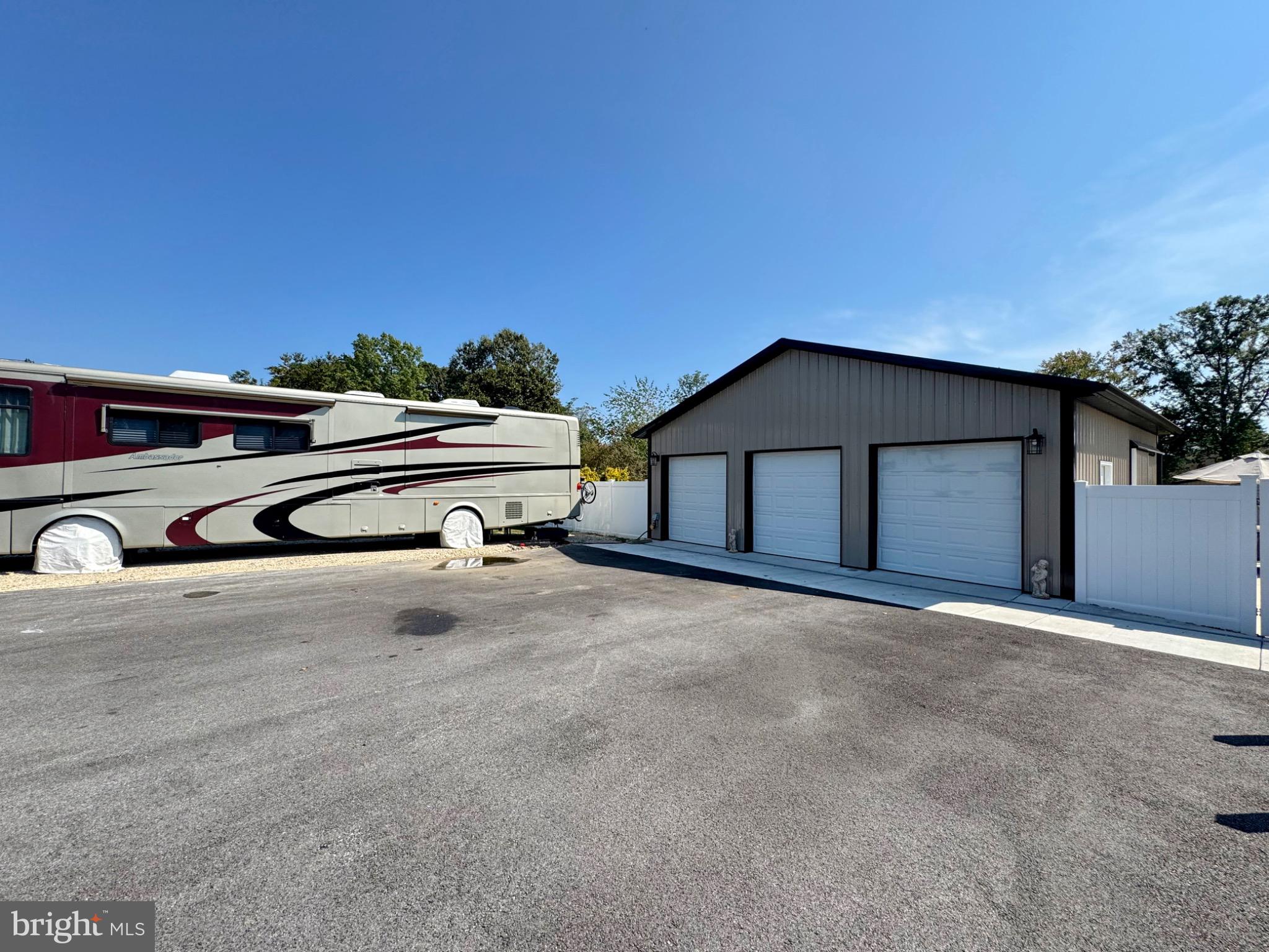 7406 Robin Road La Plata, MD 20646 - Photo 13 of 89 Spacious driveway with RV and garage access.