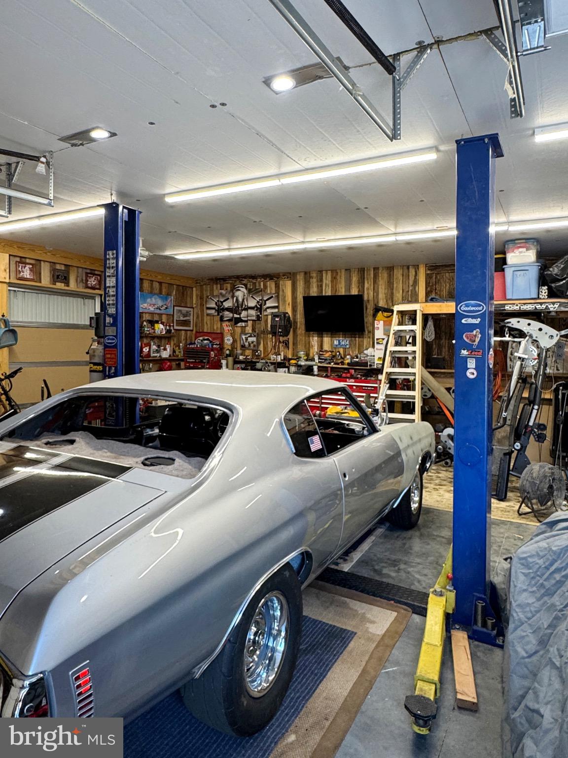 7406 Robin Road La Plata, MD 20646 - Photo 15 of 89 Classic car in a well-equipped garage.
