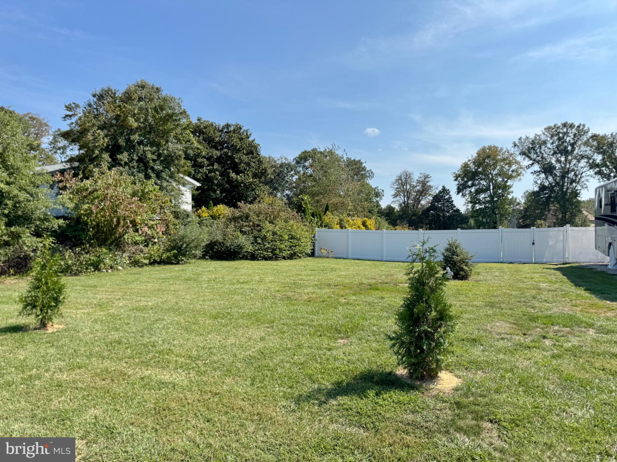 7406 Robin Road La Plata, MD 20646 - Photo 20 of 89 Spacious green yard with serene surroundings.