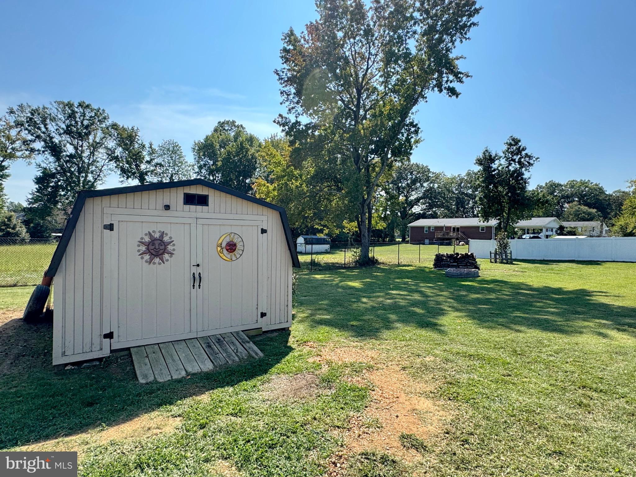 7406 Robin Road La Plata, MD 20646 - Photo 21 of 89 Charming backyard with a rustic shed.