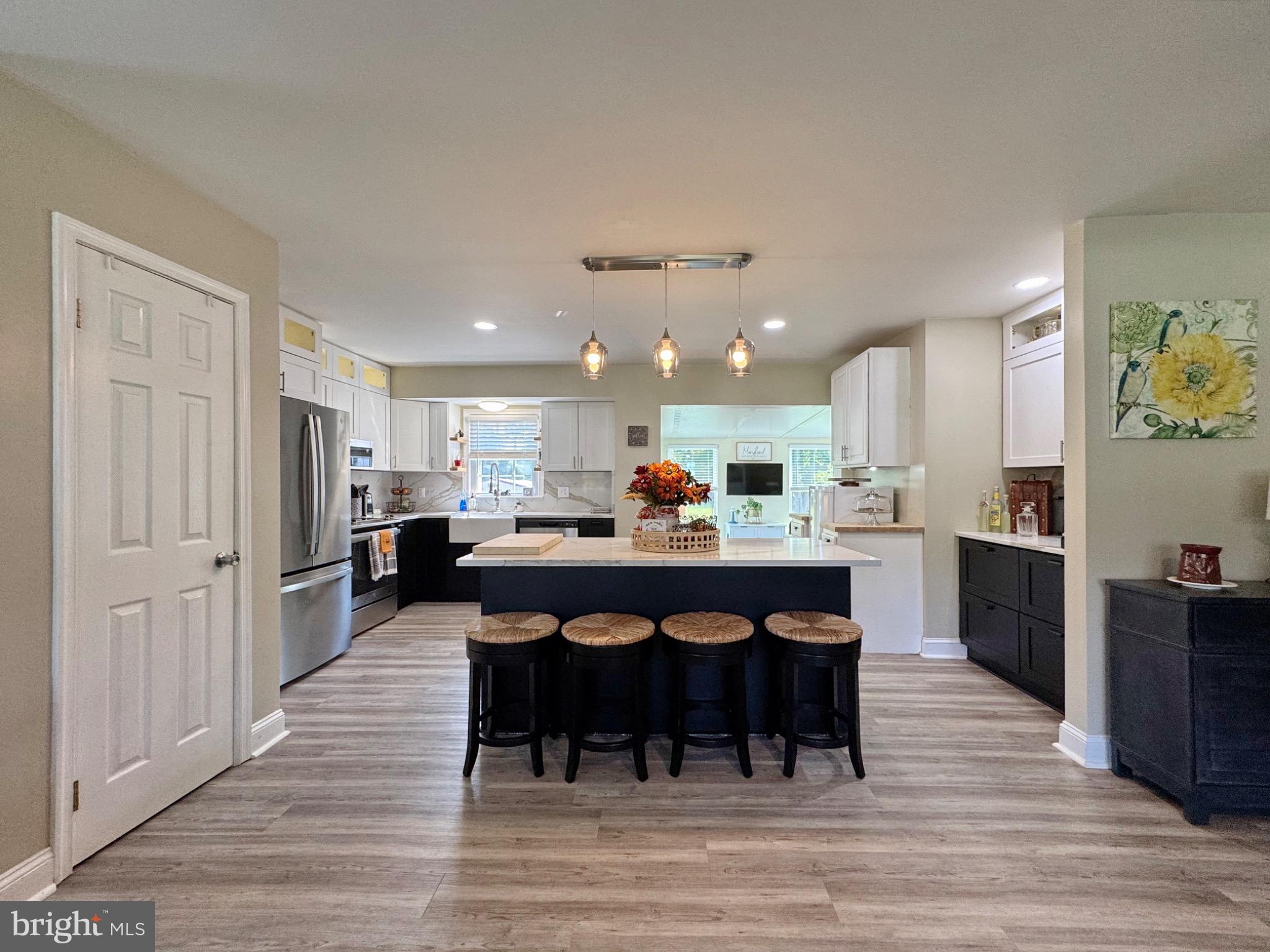 7406 Robin Road La Plata, MD 20646 - Photo 29 of 89 Modern kitchen with sleek design and light.