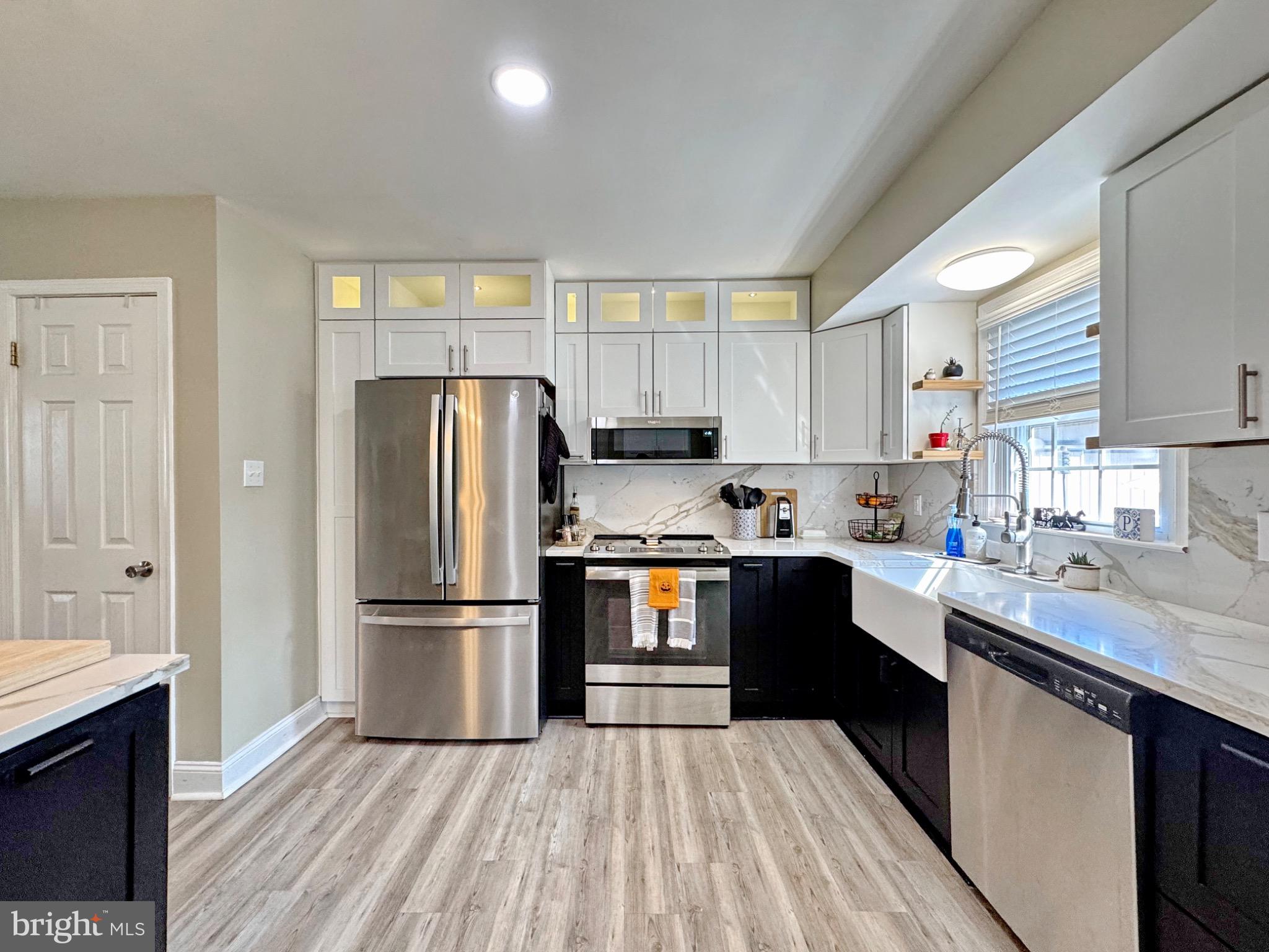 7406 Robin Road La Plata, MD 20646 - Photo 34 of 89 Modern kitchen with sleek finishes.