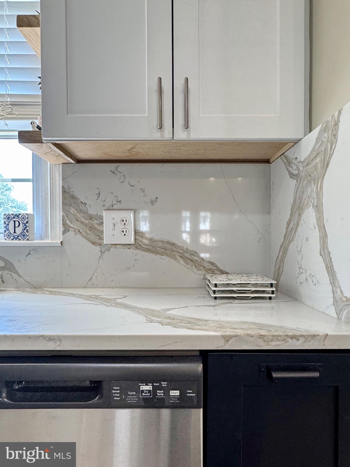 7406 Robin Road La Plata, MD 20646 - Photo 37 of 89 Elegant kitchen with sleek marble accents.