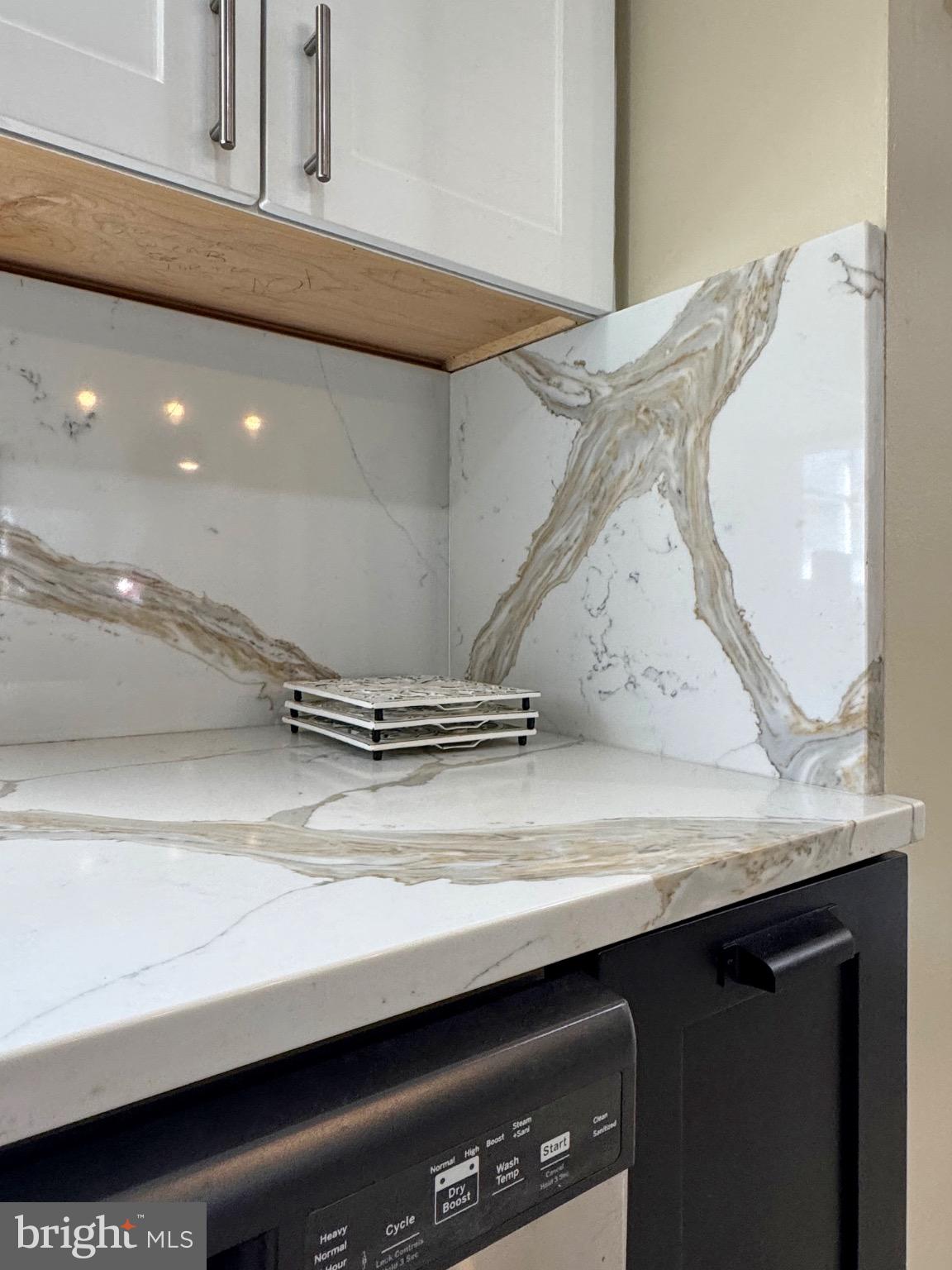 7406 Robin Road La Plata, MD 20646 - Photo 38 of 89 Elegant marble accents in a modern kitchen.