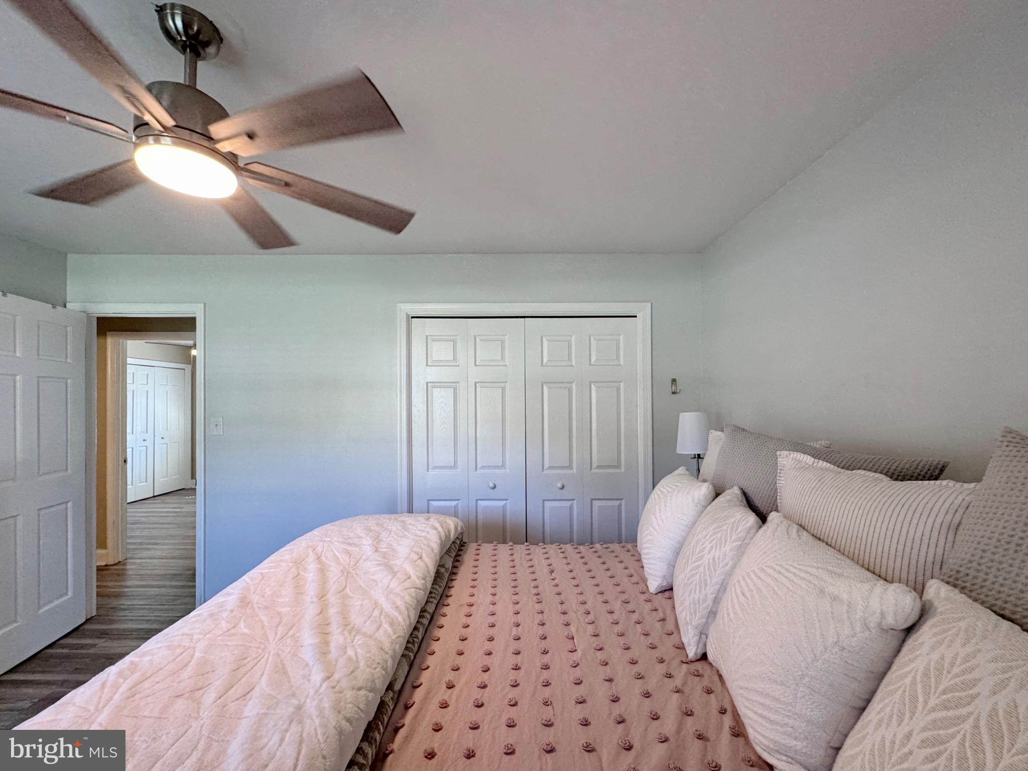 7406 Robin Road La Plata, MD 20646 - Photo 47 of 89 Serene bedroom with modern ceiling fan.