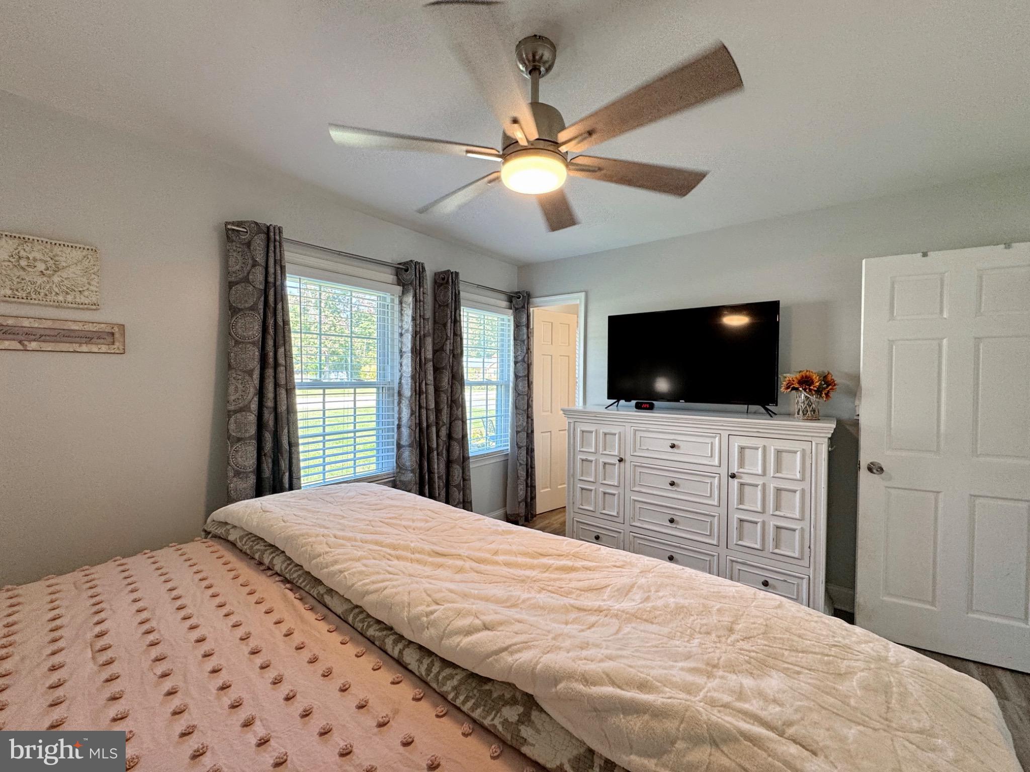 7406 Robin Road La Plata, MD 20646 - Photo 48 of 89 Serene bedroom with natural light and style.