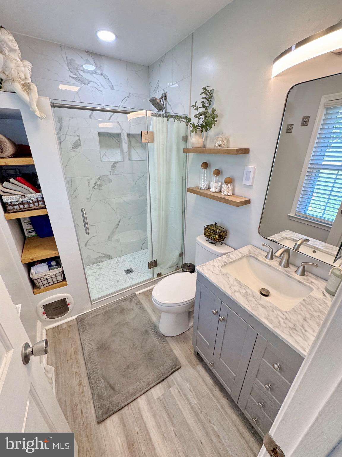 7406 Robin Road La Plata, MD 20646 - Photo 49 of 89 Modern bathroom with sleek finishes.
