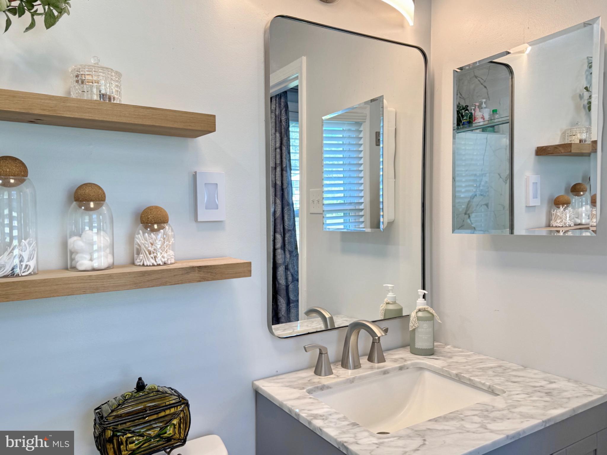 7406 Robin Road La Plata, MD 20646 - Photo 53 of 89 Sleek bathroom with modern elegance.