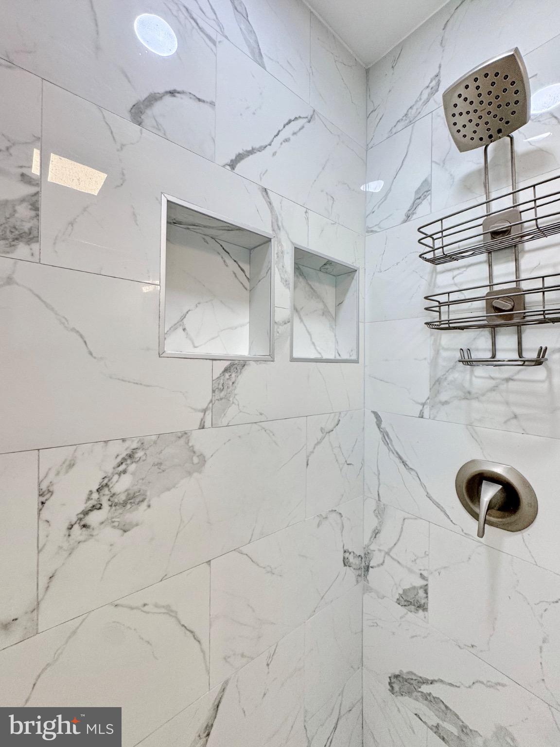 7406 Robin Road La Plata, MD 20646 - Photo 56 of 89 Elegant marble shower with modern fixtures.