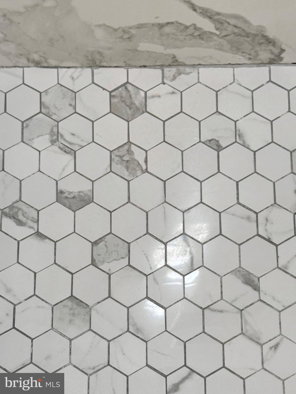 7406 Robin Road La Plata, MD 20646 - Photo 57 of 89 Elegant hexagonal marble tile design.