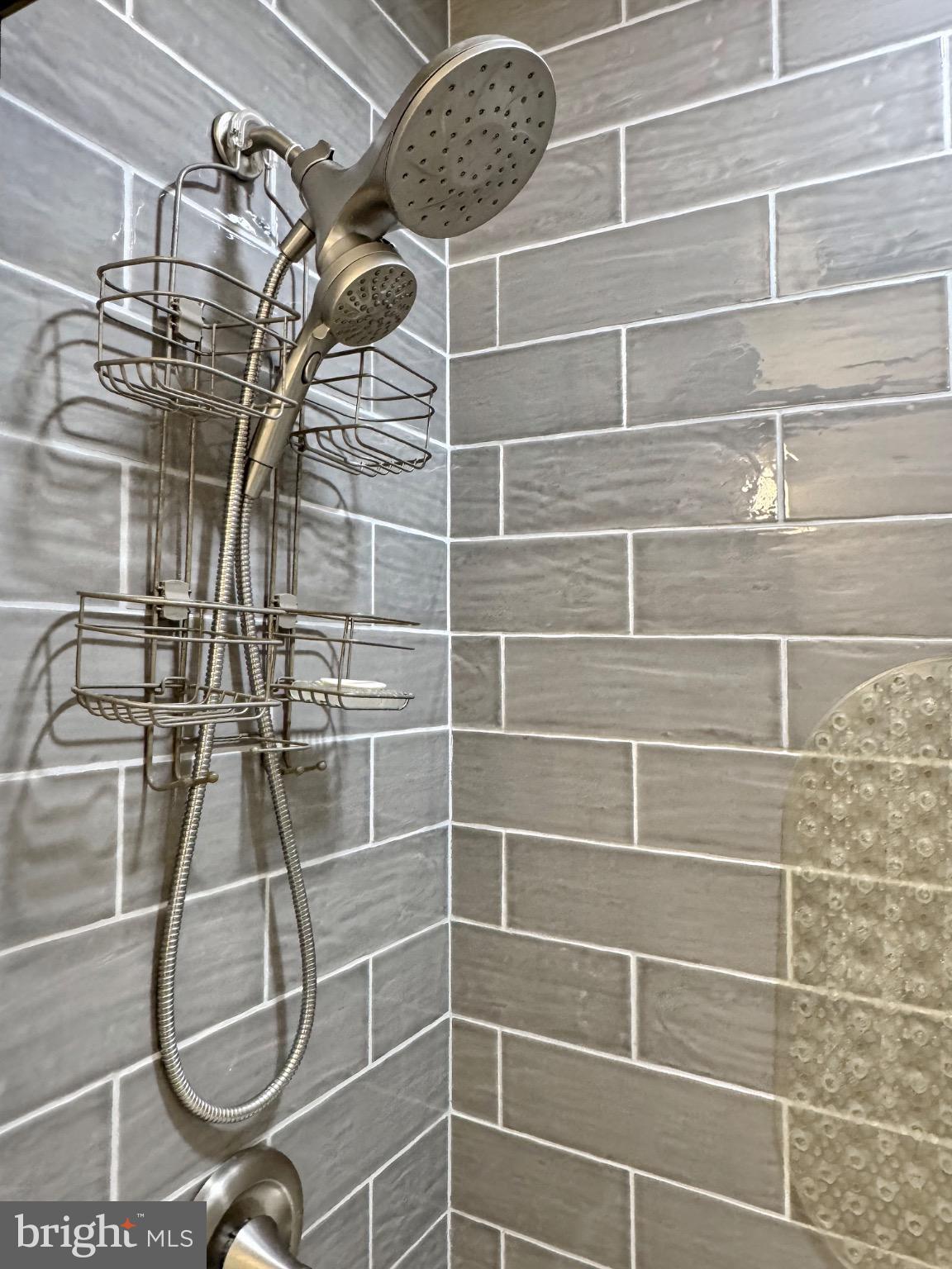 7406 Robin Road La Plata, MD 20646 - Photo 66 of 89 Sleek shower design with modern tiles.