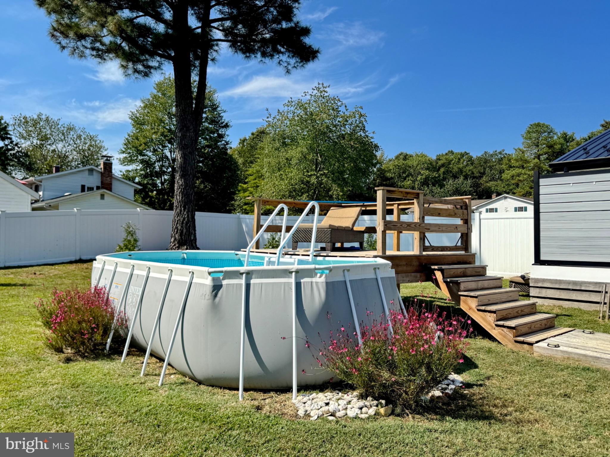 7406 Robin Road La Plata, MD 20646 - Photo 78 of 89 Charming backyard oasis with pool retreat.