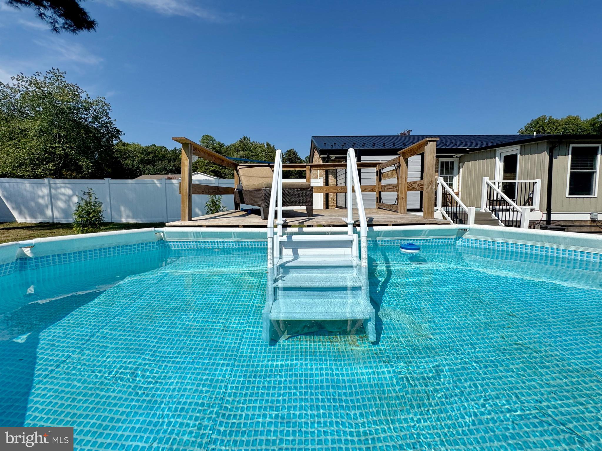 7406 Robin Road La Plata, MD 20646 - Photo 79 of 89 Sunny oasis with inviting pool retreat.