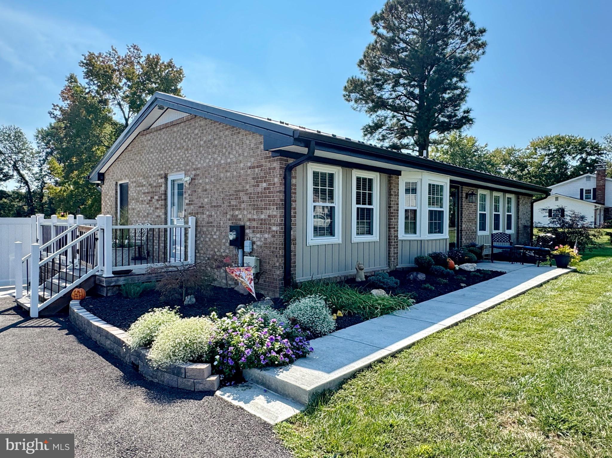 7406 Robin Road La Plata, MD 20646 - Photo 8 of 89 Charming home with vibrant landscaping.