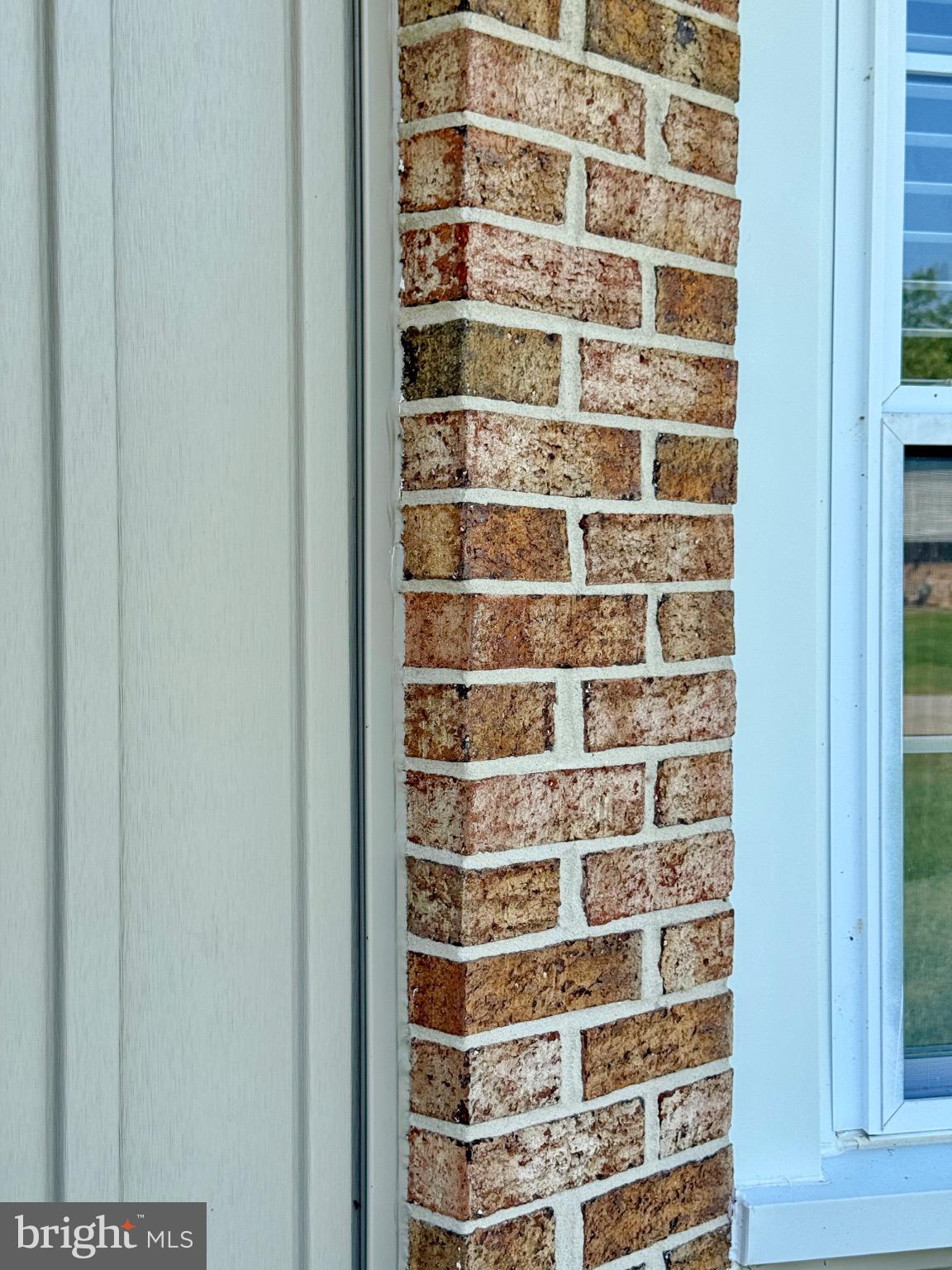 7406 Robin Road La Plata, MD 20646 - Photo 84 of 89 Textured brick corner meets modern design.