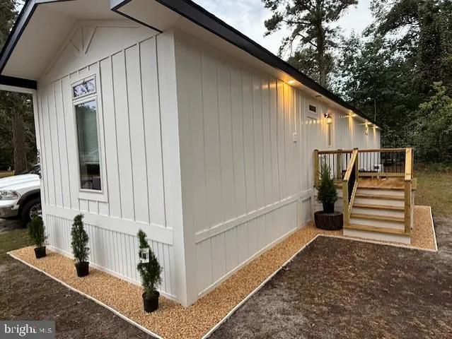 a view of a porch with furniture