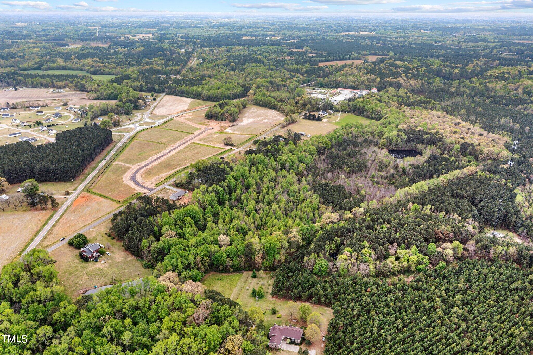 0 Atkinson Mill Road Middlesex, NC 27557 - Photo 9 of 12 an aerial view of a house with a yard