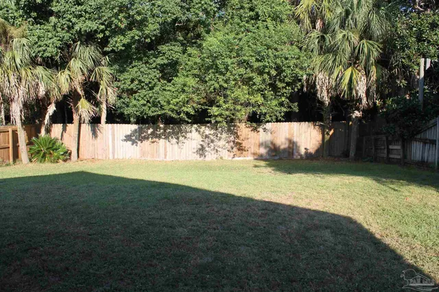 a view of outdoor space and yard