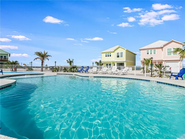a swimming pool view with a outdoor space