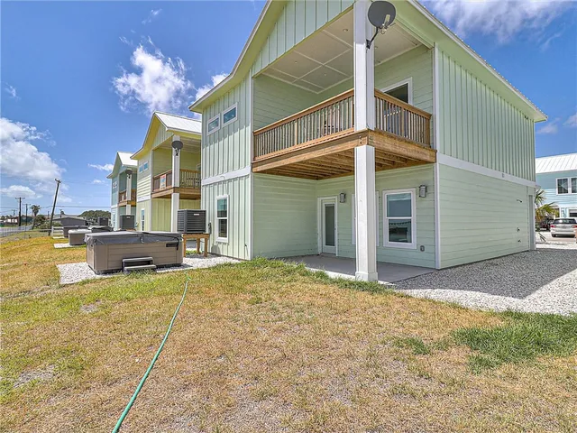 a view of a house with swimming pool