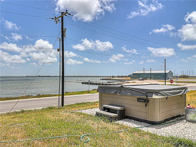 a view of a swimming pool with a lounge chairs