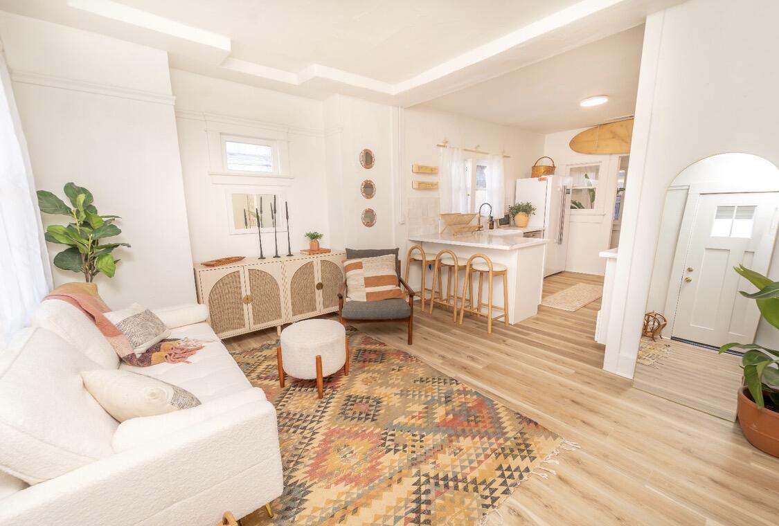 232 Ash Street Exeter, CA 93221 - Photo 6 of 13 a living room with furniture and wooden floor