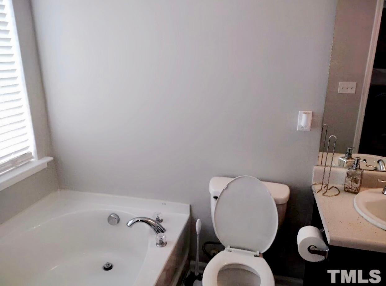 6041 Ricker Road Raleigh, NC 27610 - Photo 12 of 20 Master Garden Tub
