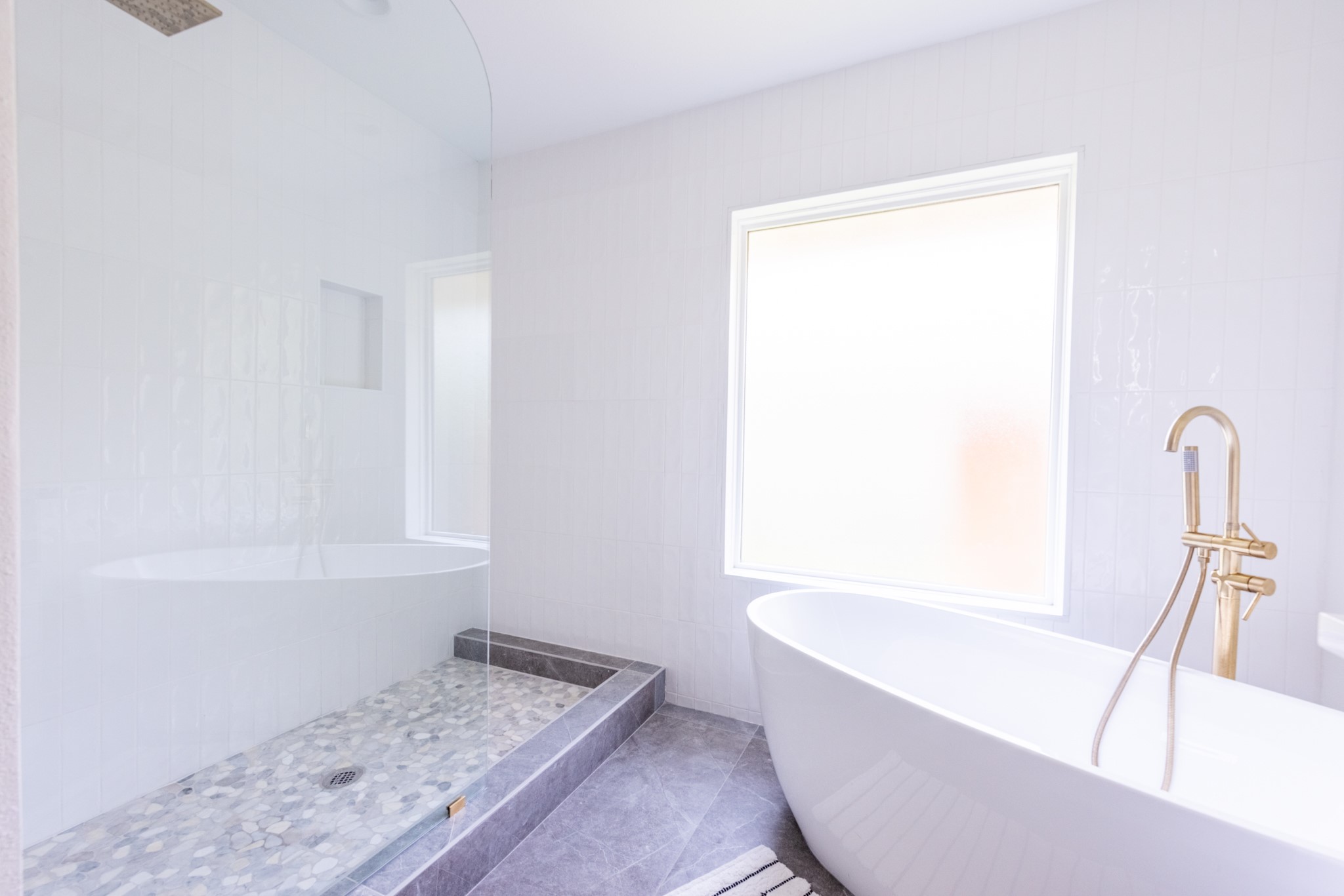 7304 Geneva Drive Austin, TX 78723 - Photo 20 of 39 a bathroom with a bathtub and a window