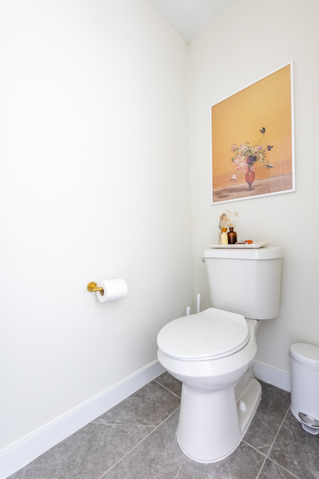 7304 Geneva Drive Austin, TX 78723 - Photo 22 of 39 a white toilet sitting next to a bathroom sink