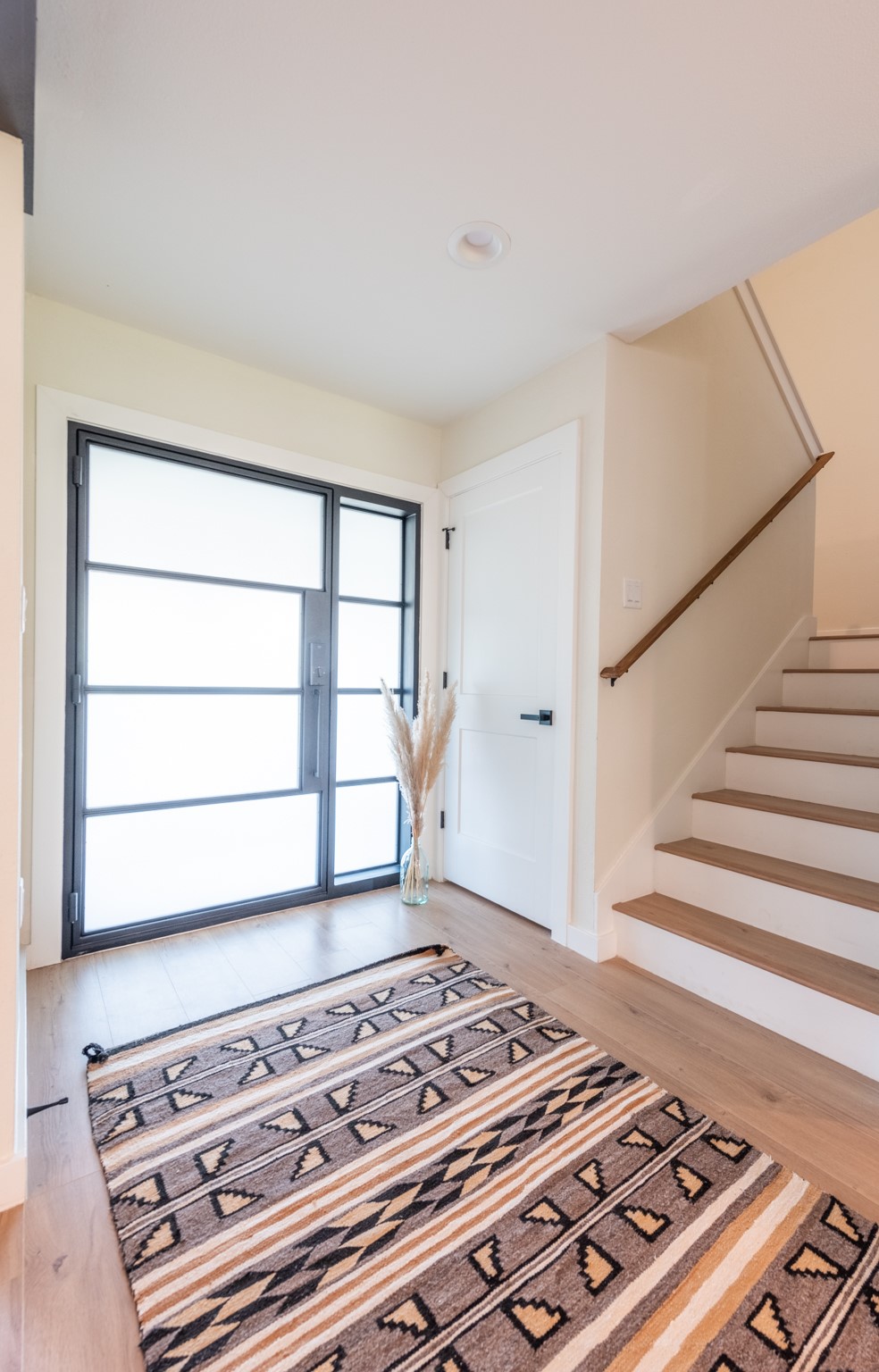7304 Geneva Drive Austin, TX 78723 - Photo 23 of 39 a view of a room with wooden floor and white walls