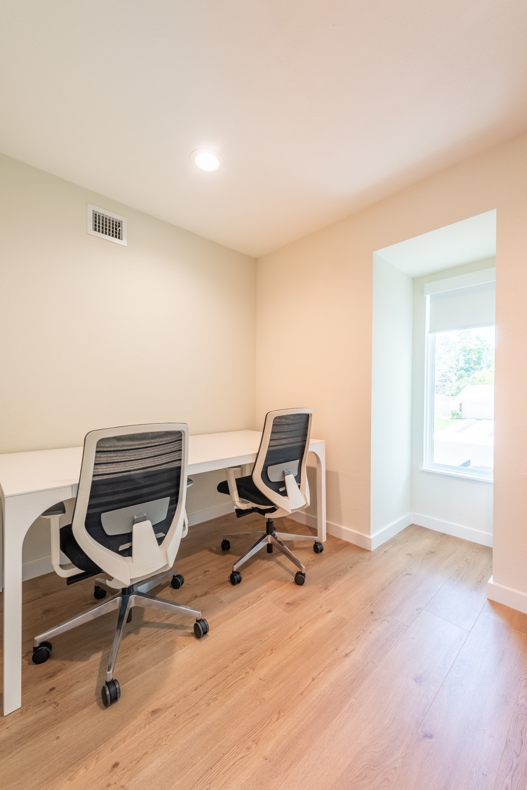 7304 Geneva Drive Austin, TX 78723 - Photo 32 of 39 a view of a workspace with furniture and a window