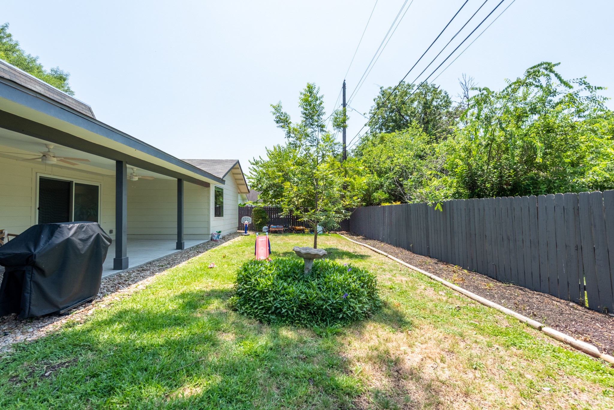 7304 Geneva Drive Austin, TX 78723 - Photo 39 of 39 a backyard of a house with seating space