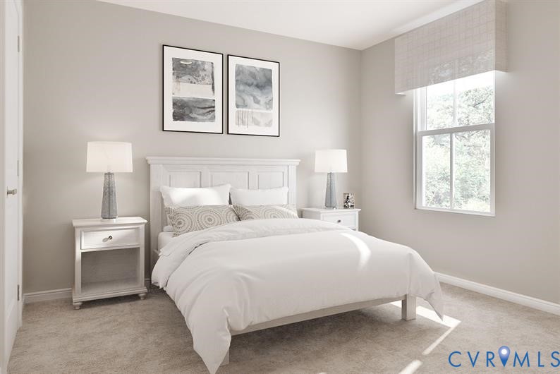 1 Destination Drive, Unit B Sandston, VA 23150 - Photo 7 of 9 a bedroom with a bed and a window