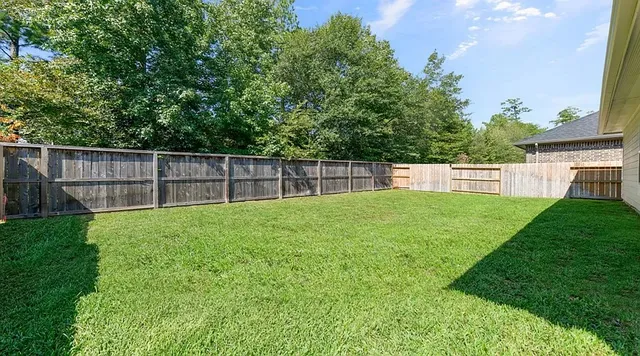 a view of a backyard with a garden