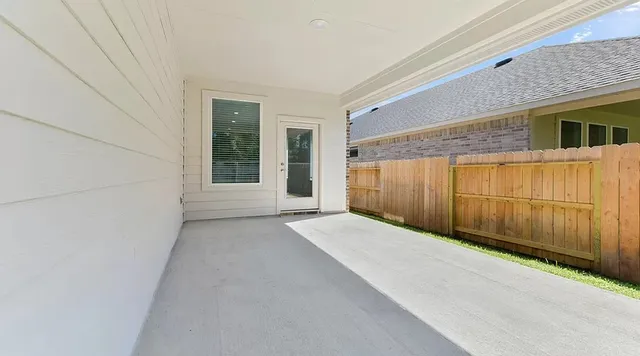 a view of a backyard of a house