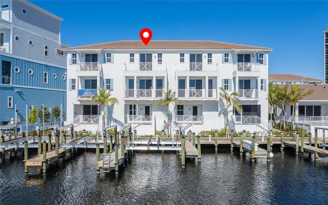 a view of a building with outdoor seating