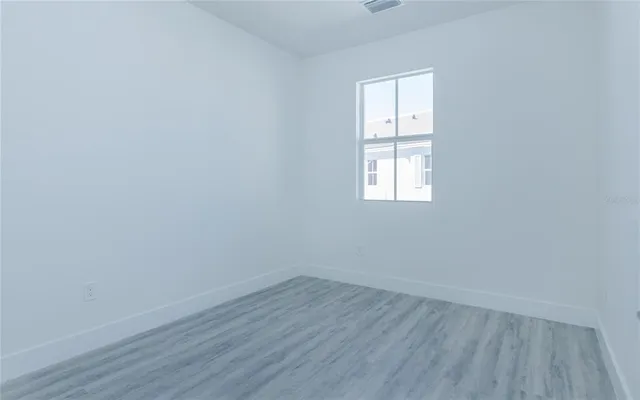 an empty room with a window
