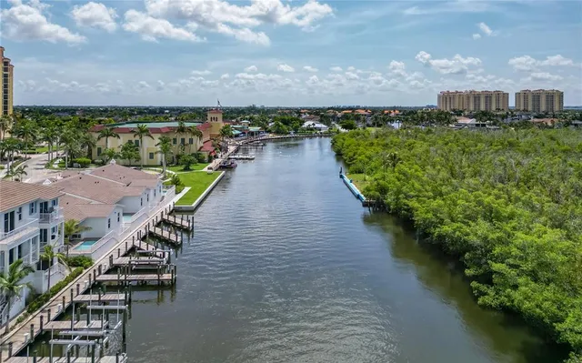 a view of a lake with a yard