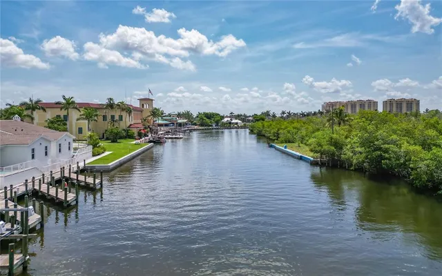 an aerial view of a house with a lake view