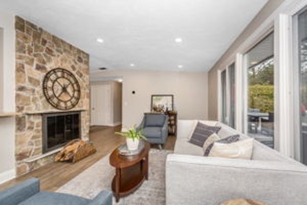 9 Irene Road Framingham, MA 01701 - Photo 14 of 36 a living room with furniture and a fireplace