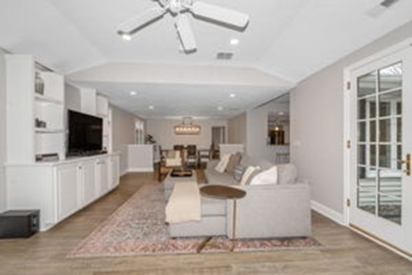 9 Irene Road Framingham, MA 01701 - Photo 19 of 36 a living room with furniture and a flat screen tv