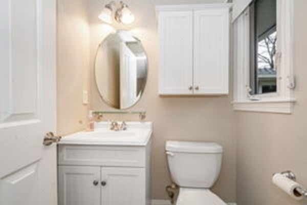 9 Irene Road Framingham, MA 01701 - Photo 28 of 36 a bathroom with a toilet sink and mirror