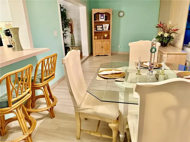 a workspace with furniture and wooden floor