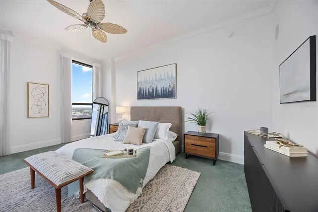 a kitchen with a granite countertop sink and a washer dryer